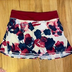 Lululemon pink, blue, & white floral Pace Setter ruffle skirt, size 4 tall